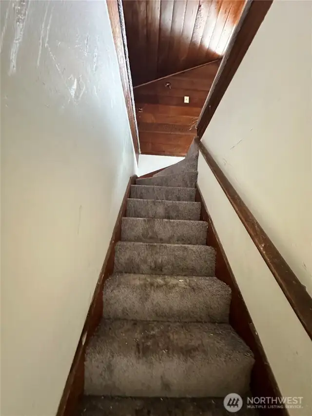 Head upstairs to the Primary Bedroom