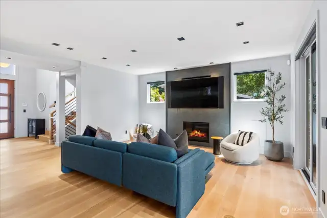 Wide-plank engineered oak flooring & solid core interior doors for warmth, weight & sound control