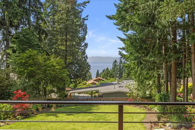 Revel in west-facing Puget Sound views that captivate from all three levels of the home.