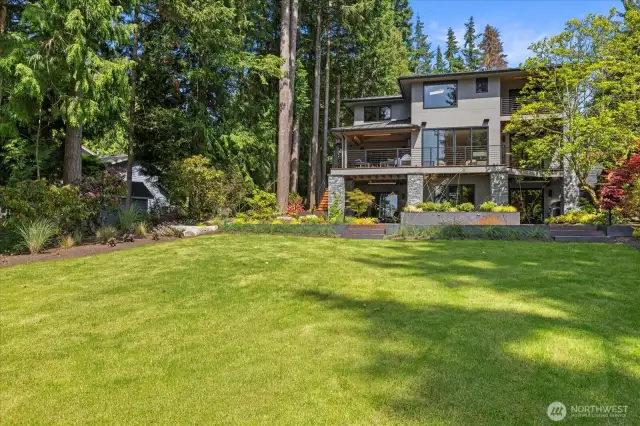Set on more than a half-acre, the home’s expansive private yard is a rare luxury for "new" construction—perfect for outdoor living and entertaining.