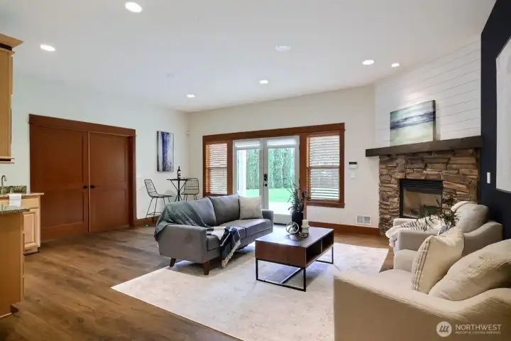 Living area on lower level with access to outdoor patio