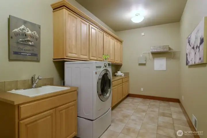 Large laundry room with sink on the lower level