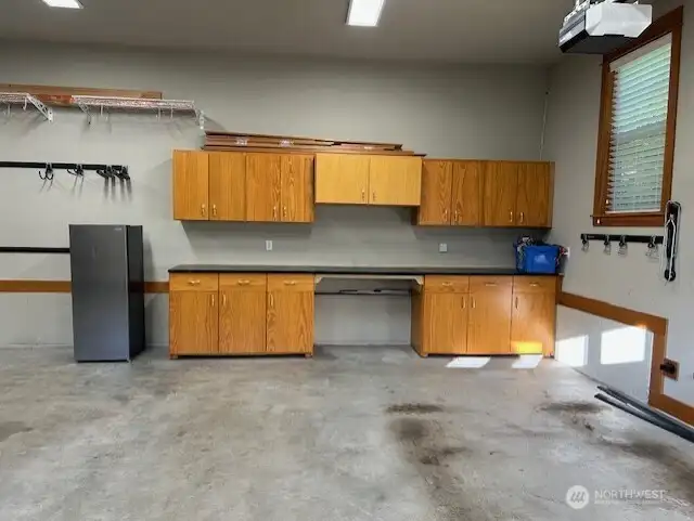 Ample shop area in large 3 car garage