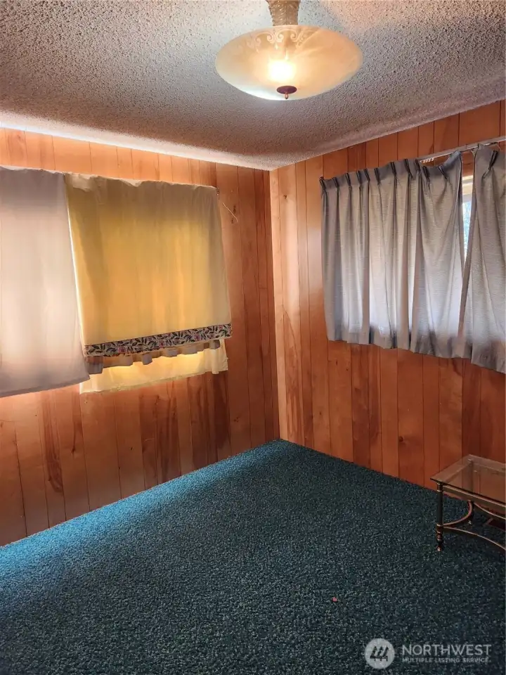 Bedroom 2. Large windows allow for plenty of natural light, room to be emptied prior to closing