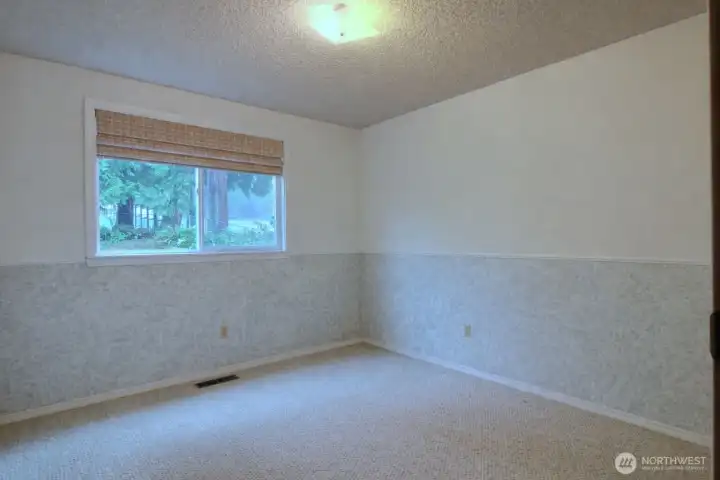 3rd bedroom on upper level - also good sized with double windows overlooking the front yard.