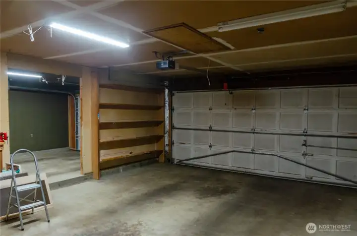 The two garage spaces flow together nicely with just a step separating them.