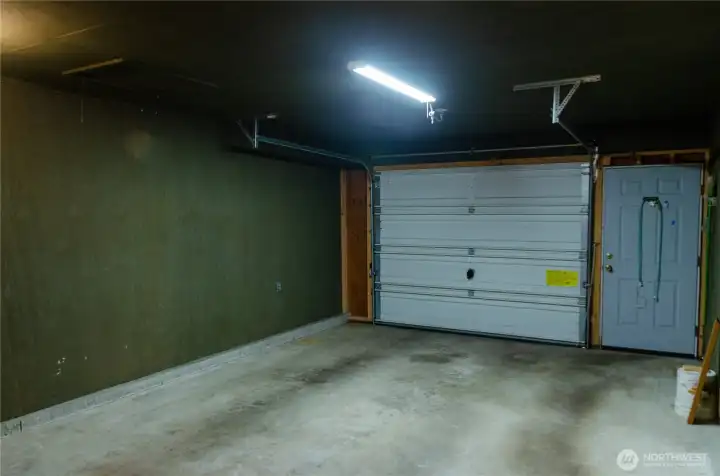 This is the 3rd bay addition with man door to driveway.