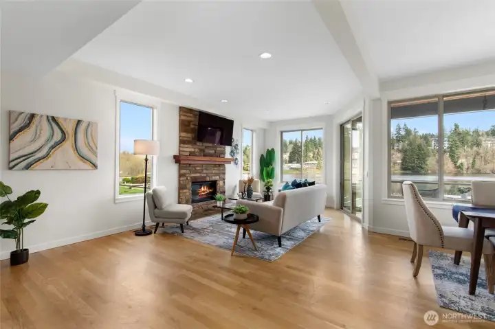 Open floorplan with gleaming hardwood floors