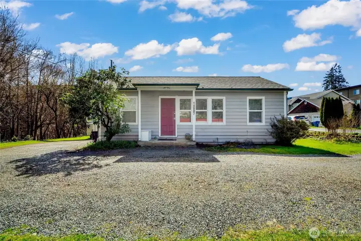 Plenty of parking in driveway & on side of home