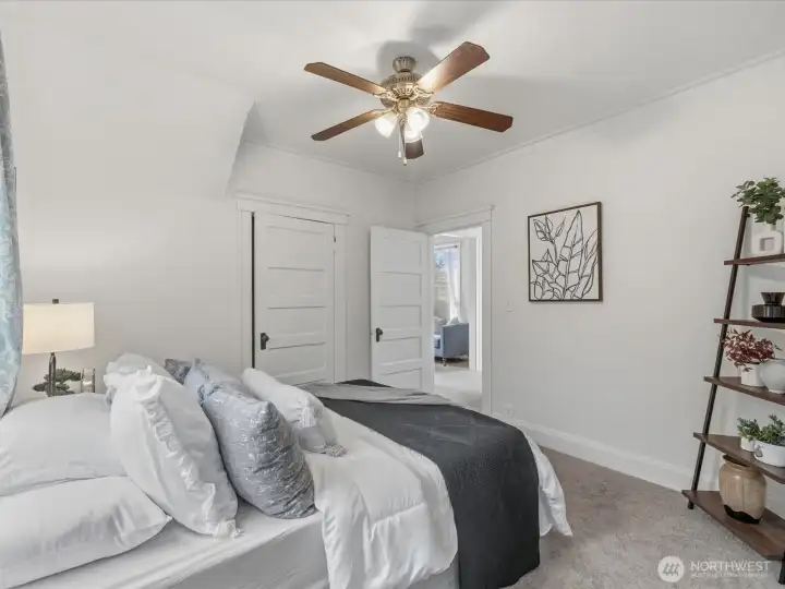 The main level primary bedroom. This room could also be a perfect family room if desired.
