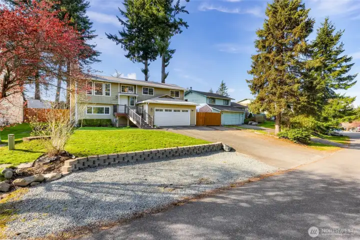 This home is located in desirable Tweed Twenty neighborhood, on a large sun filled lot.