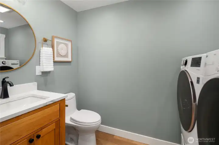 this is the powder room and laundry area. this is the powder room and laundry area.