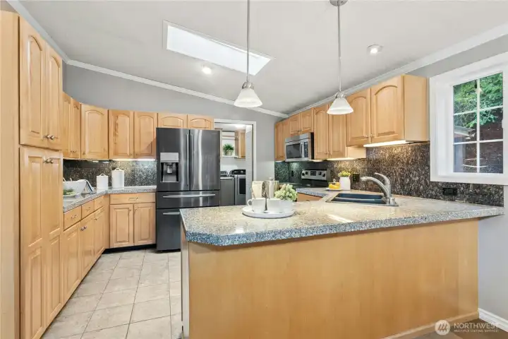 Ample cabinet space in kitchen with undercabinet lighting!