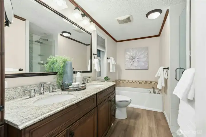 Full bath off primary with separate bath & shower!