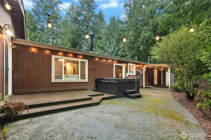 Backyard fun with hot tub, covered patio and deck!
