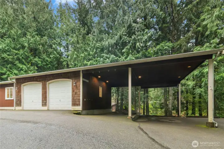 Detached garage, with oversized garage doors, and extra tall covered parking!
