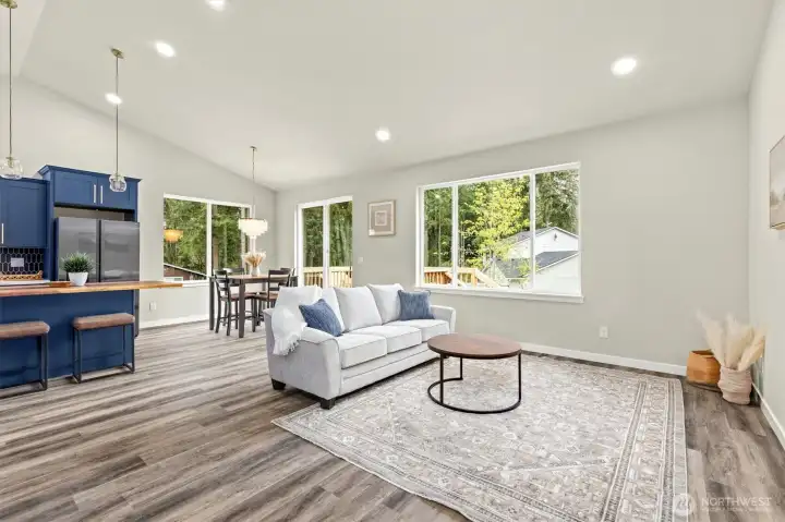 Open living room, dining room and kitchen.