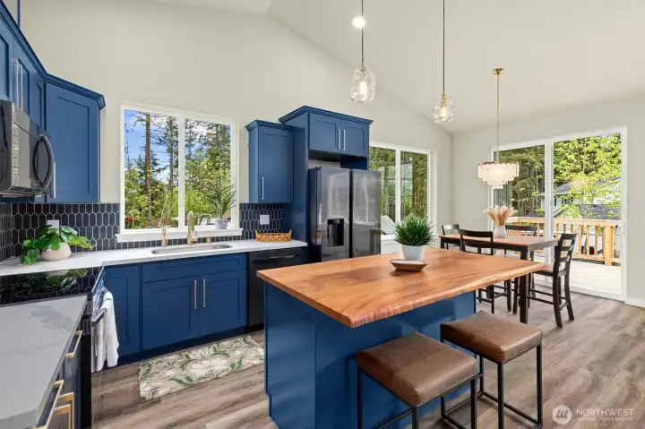 Kitchen with eating space and dining room.