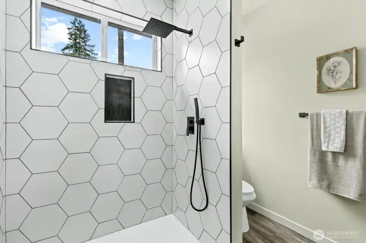 Primary tile shower.