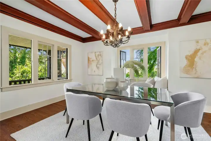 Expansive dining room with a windowseat and built-ins.