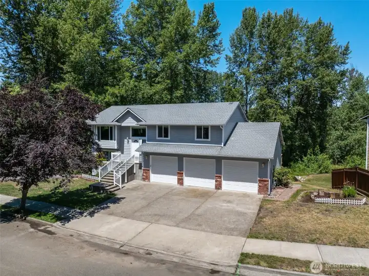 The oversized 3 car garage adds to the enjoyment of this Home, with brand new exterior paint.