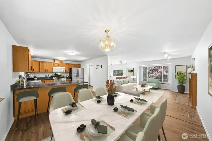 The Eating Area offers easy access to the Kitchen & Family Room. (Virtually staged).