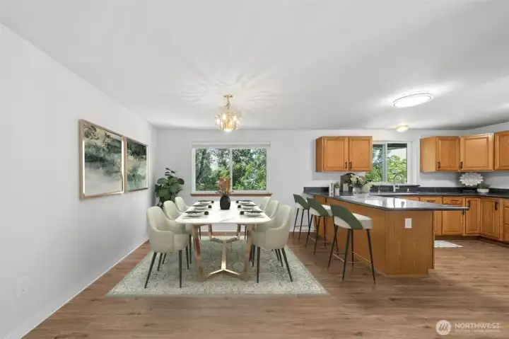 Enjoy gathering in the Eating Area, overlooking the backyard and peaceful pond. (Virtually staged).