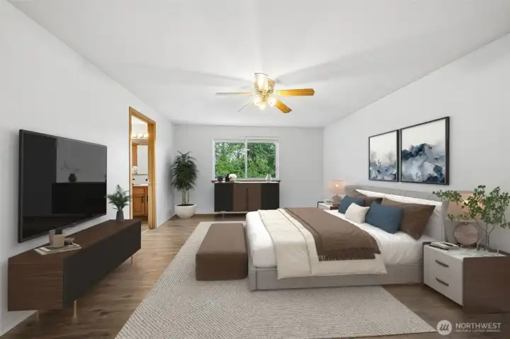 The Primary Suite is peacefully located overlooking the private backyard. (Virtually staged).