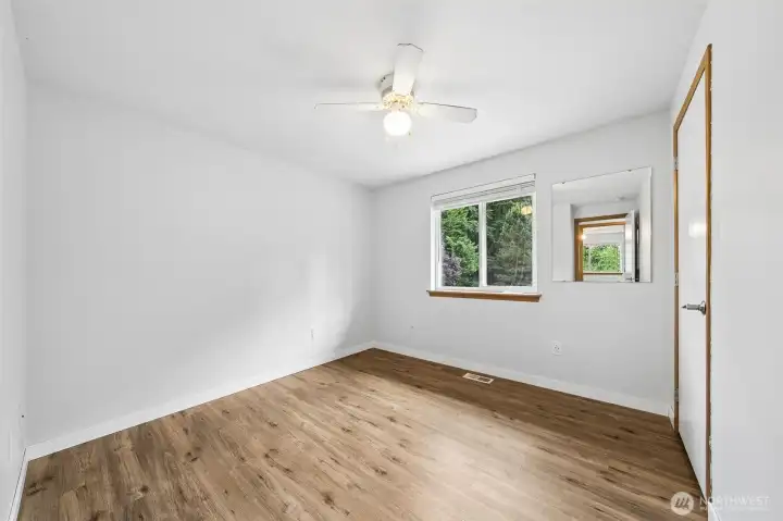 Bedroom #3, located on the upper floor, overlooking the front of the house.