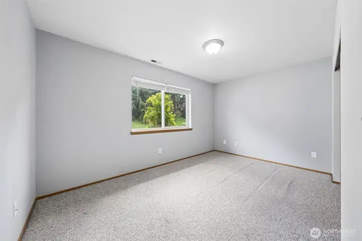 Bedroom #4, located on the lower floor, overlooking the front of the house.