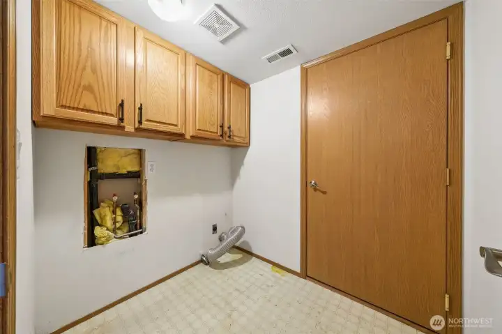 The Laundry Room is located on the lower floor, with access to the furnace room.