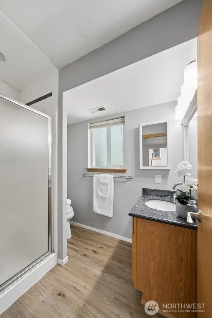 A 3/4 Bath is conveniently located on the lower floor, off of the bedrooms.