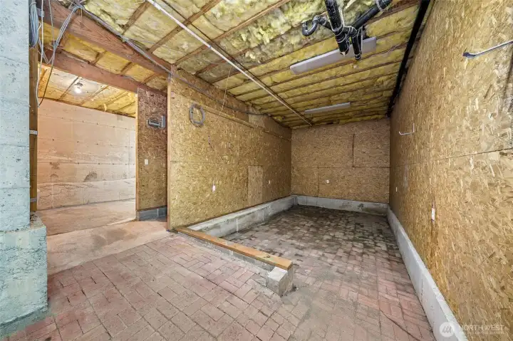 Extra storage under the house, with access under the deck, complete with power.