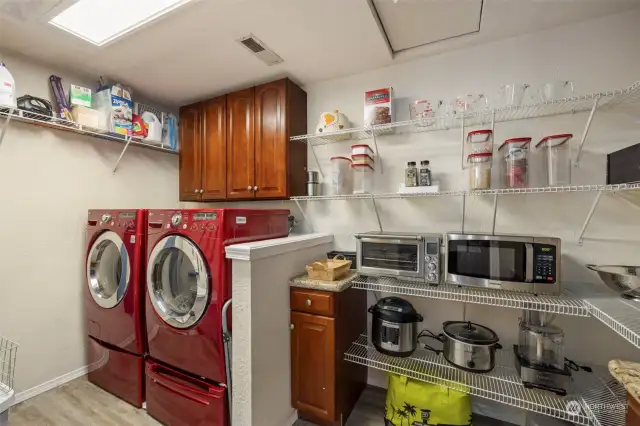 Laundry room and spacious pantry right off of the kitchen - so handy!