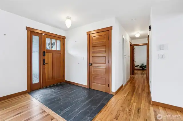 Beautiful entrance with stunning hardwood floors. Hallway leads you to the primary bedroom with additional space to make an office or close off for bedroom. Second bedroom across from conjoined ha bathroom