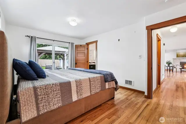 Easy access to the the back patio for morning sun, open feeling with the large doors. bathroom attached to the primary.