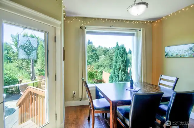 Dining area and steps to rear yard/patio