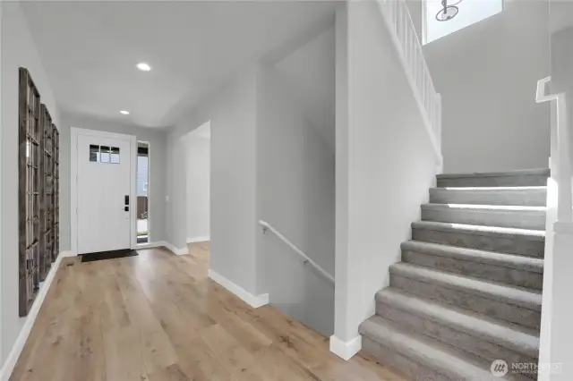 Long entry hall. Notice the new LVP floor.