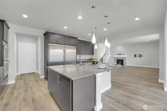 Pantry and extra storage closet on both sides of the garage entrance.