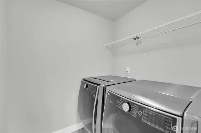 Upstairs laundry room. Washer and dryer are included.