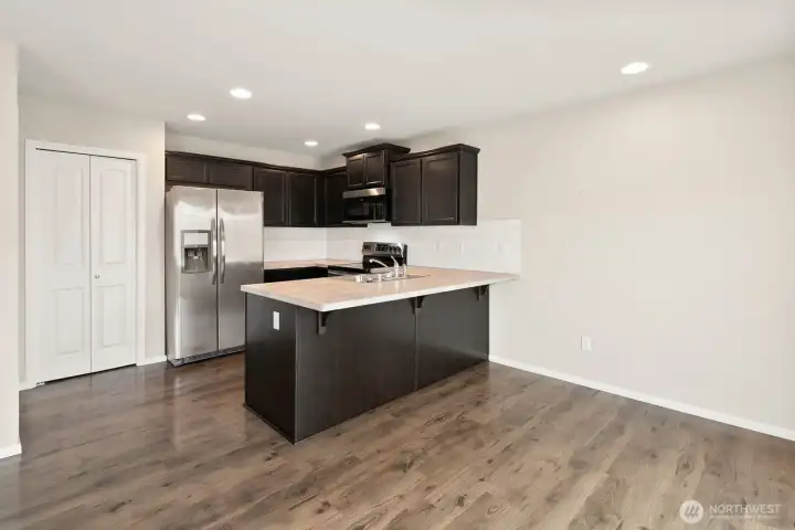 Open kitchen area where you can entertain and still be part pf the gathering.