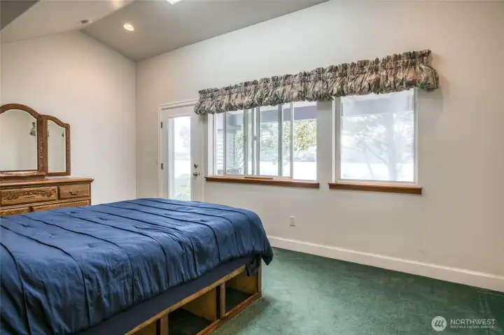 Primary on main floor with lake views