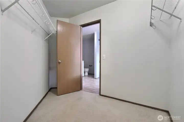 Primary walk in closet.
