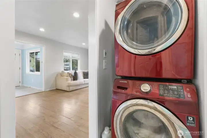 Laundry, next to secondary bathroom & bedrooms.
