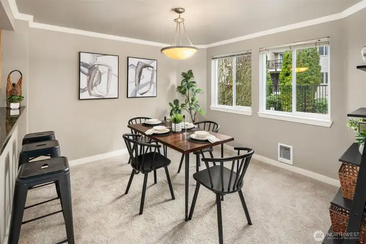 Dining room overlooks lawn & pool