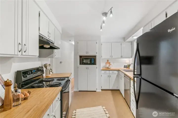 Crisp lines in this well-sized kitchen with tons of storage.