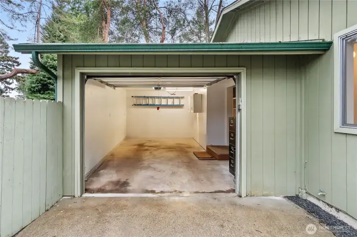 Large garage provides plenty of space for storage with direct access into the house.