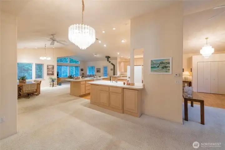 formal living room into kitchen into family room. So much open space.