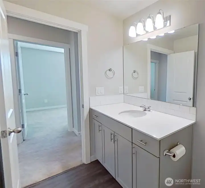Upper-level full bathroom.