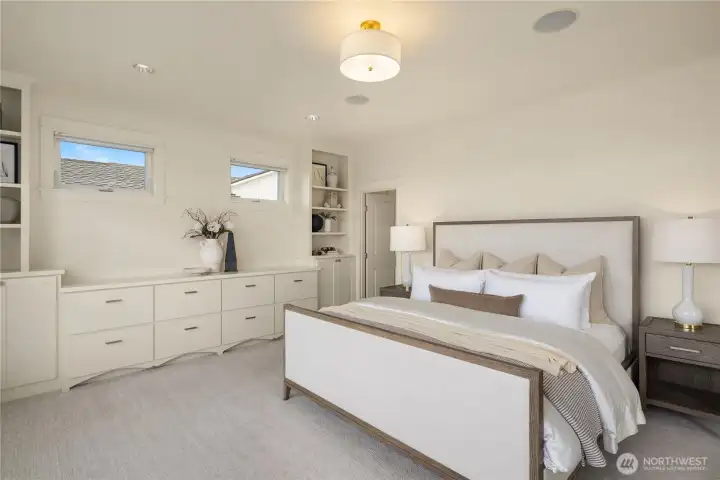 Primary Suite with wall of built-in dressers